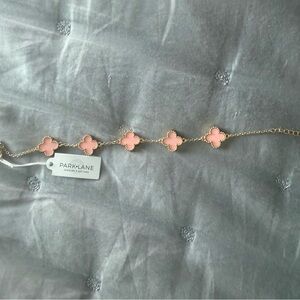 Park Lane Gold Bracelet with pink quatrefoil design